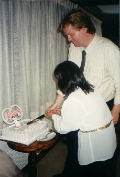 Eva cutting the cake